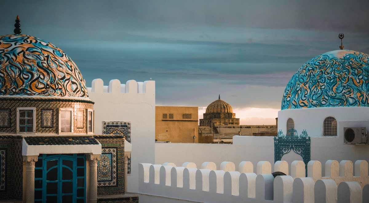 white and teal building during daytim